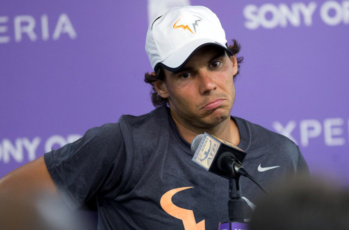 Rafael Nadal discusses his walkover victory with the media after Tomas Berdych withdrew because of gastroenteritis before their semifinal match in the Sony Open on Friday in Key Biscayne, Fla.