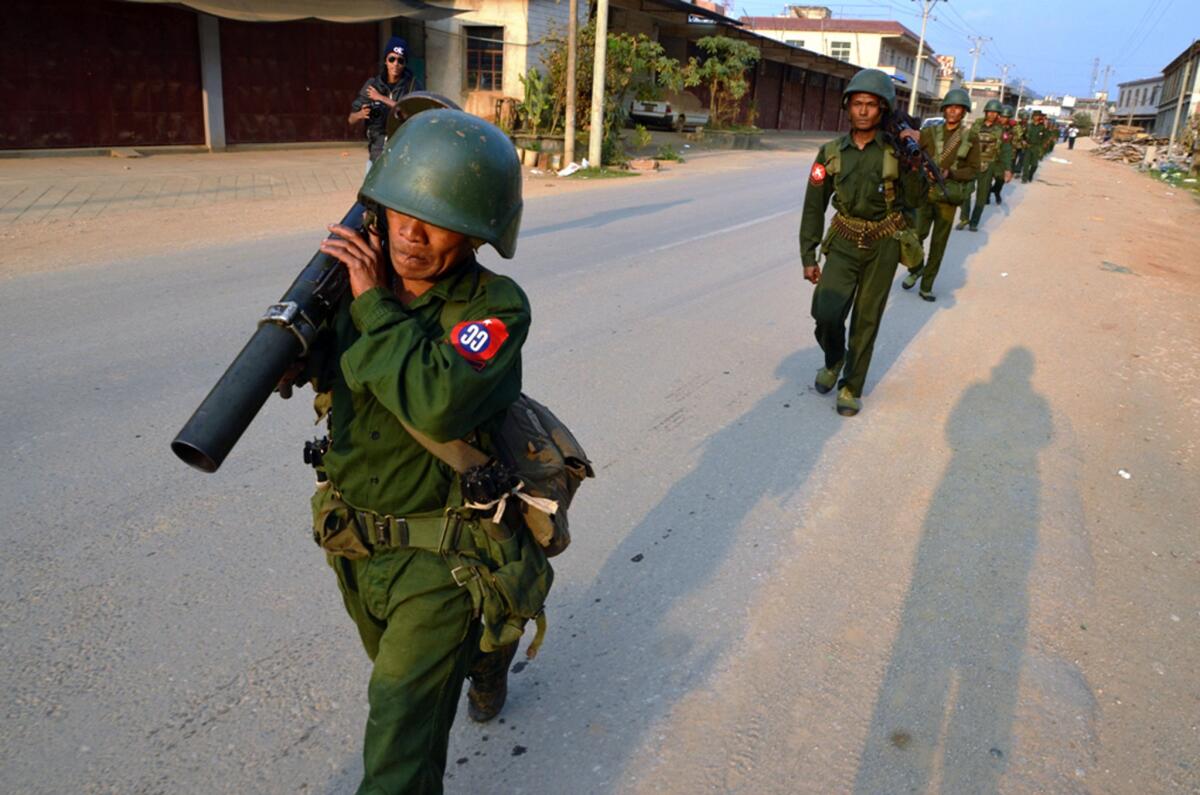 Myanmar soldiers patrol in Kokang on Feb. 17.