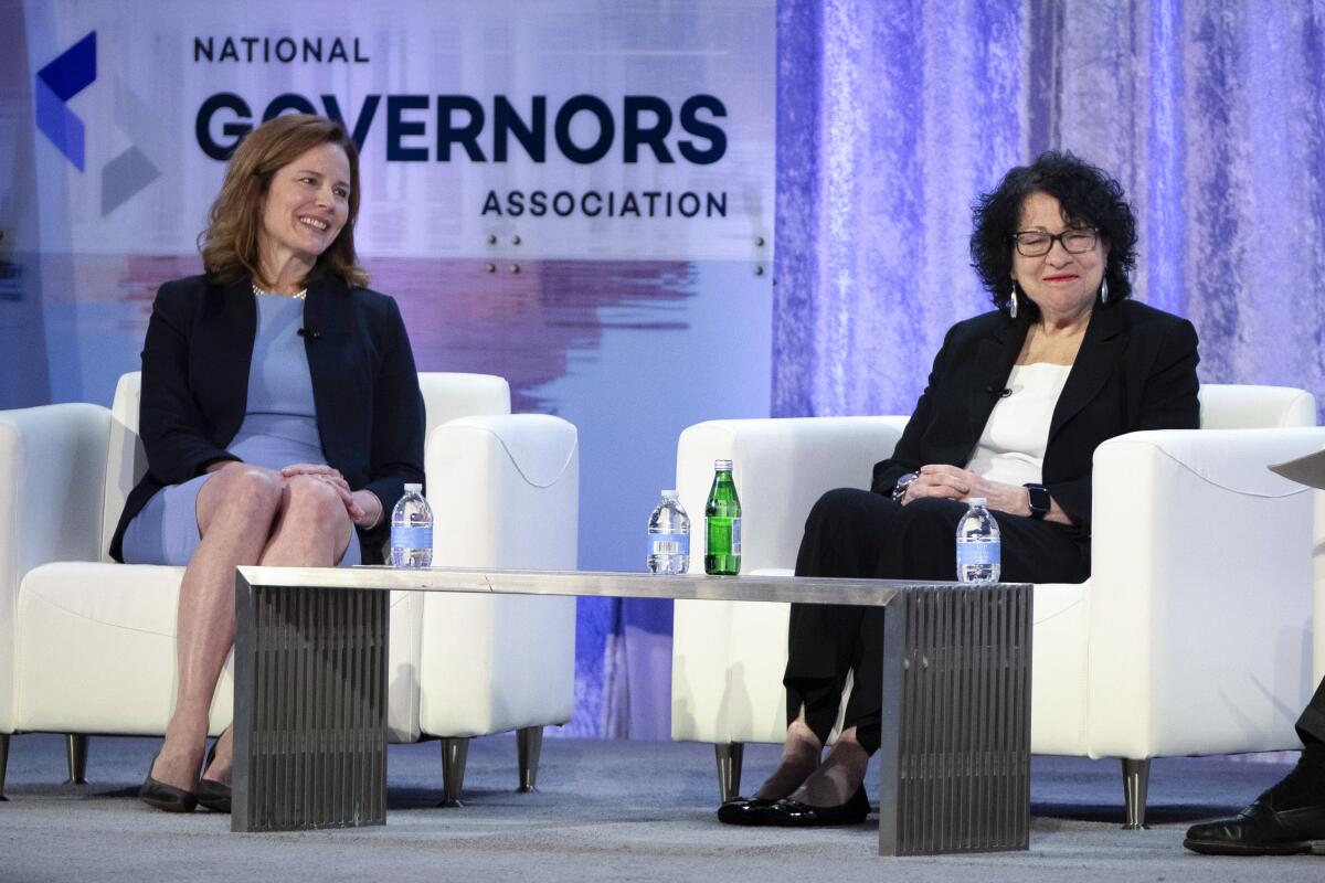 Supreme Court Justices Amy Coney Barrett, left, and Sonia Sotomayor speak.