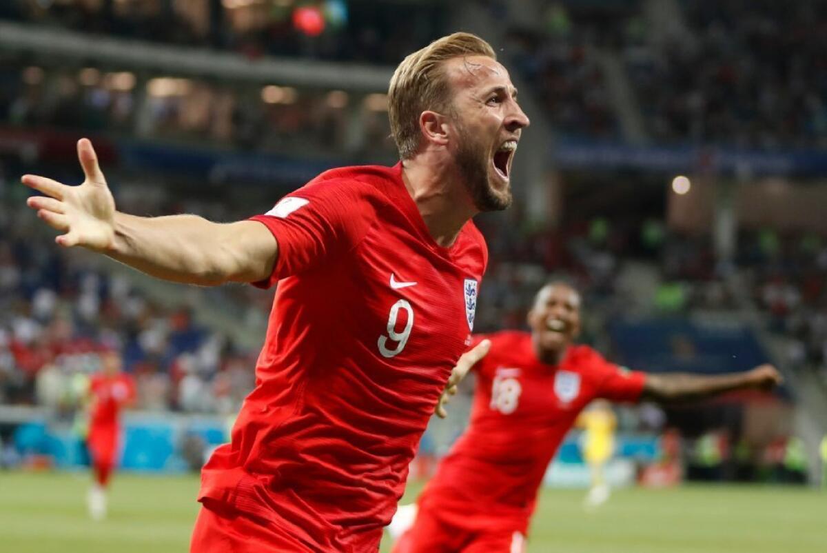England's Harry Kane celebrates after scoring the game-winning goal against Tunisia in a Group G match on June 18.