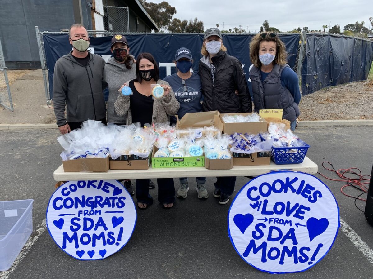 SDA Foundation passed out cookies at the Chalk the Lot event.
