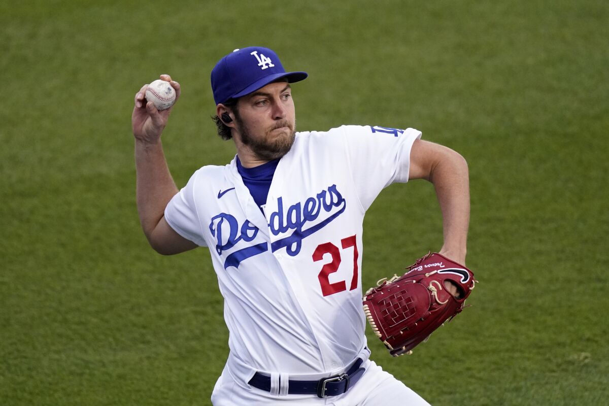 Dodgers starting pitcher Trevor Bauer warms up before a game against the Colorado Rockies on April 13, 2021.