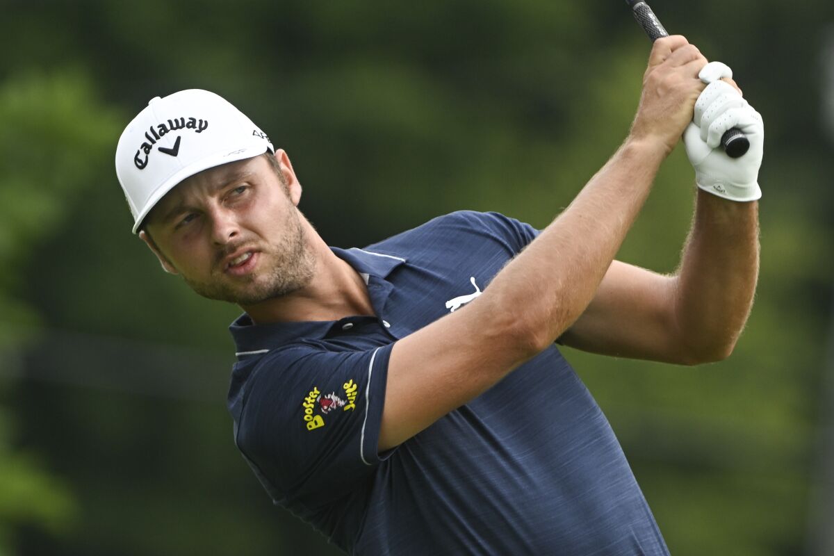 Adam Svensson hits on the fifth hole during the second round of the Barbasol Championship golf tournament, Friday July 8, 2022, in Nicholasville, Kentucky. (AP Photo/John Amis)