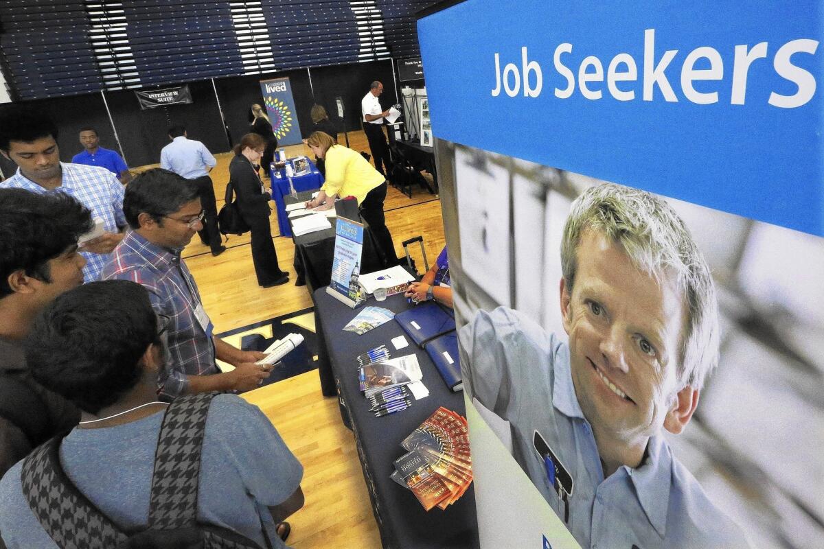 Students attend a career fair at the University of Illinois in September.