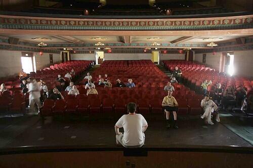 Jeremy Willis, Manager of the Rialto Theatre in South Pasadena, addresses members of a 50-person bus tour of five Los Angeles-area historic theaters.