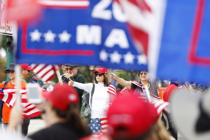 ANAHEIM-CA-SEPTEMBER 29, 2023: Trump supporters gather at the entrance to the California Republican Party Convention at the Anaheim Marriott Hotel on Friday, September 29, 2023. (Christina House / Los Angeles Times)