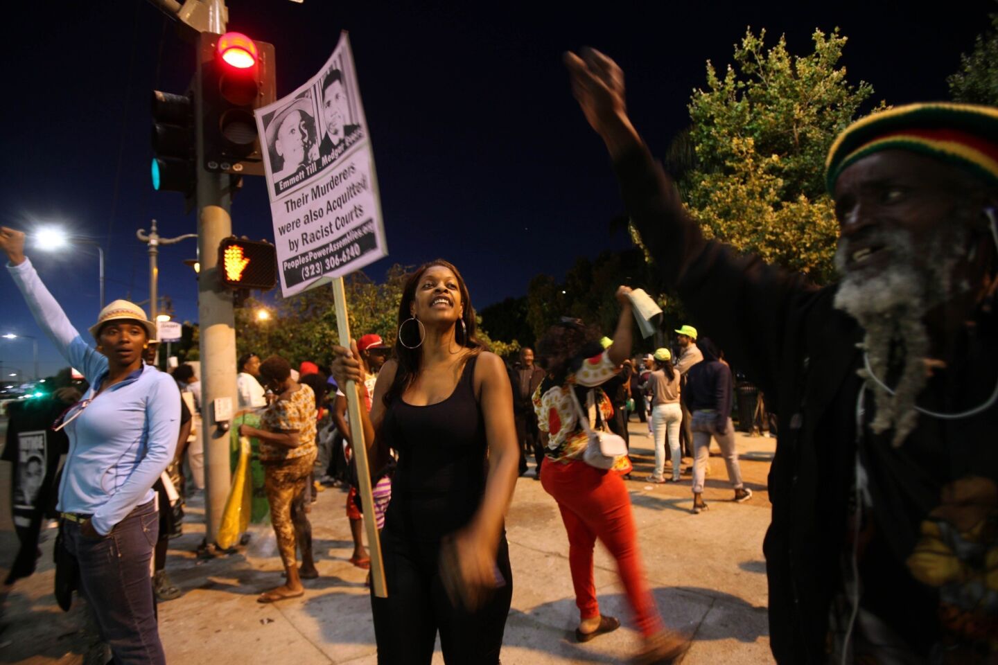 Protesters gather at Leimert Park on Tuesday evening to protest the verdict in the George Zimmerman trial. LAPD was out in full force after disturbances and violent protests on Monday night in the Crenshaw area.