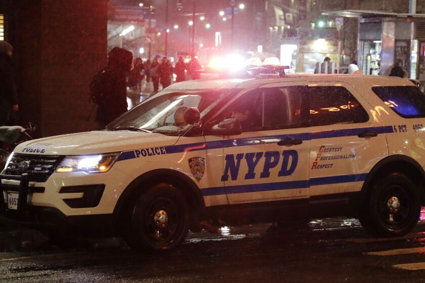 FILE - An NYPD vehicle responds, Feb. 20, 2019, in New York. New York City's reliance on the tactic known as “stop and frisk" as part of a new initiative to combat gun violence is harming communities of color and running afoul of the law, a court-appointed federal monitor reported Monday, June 5, 2023. (AP Photo/Frank Franklin II, File)