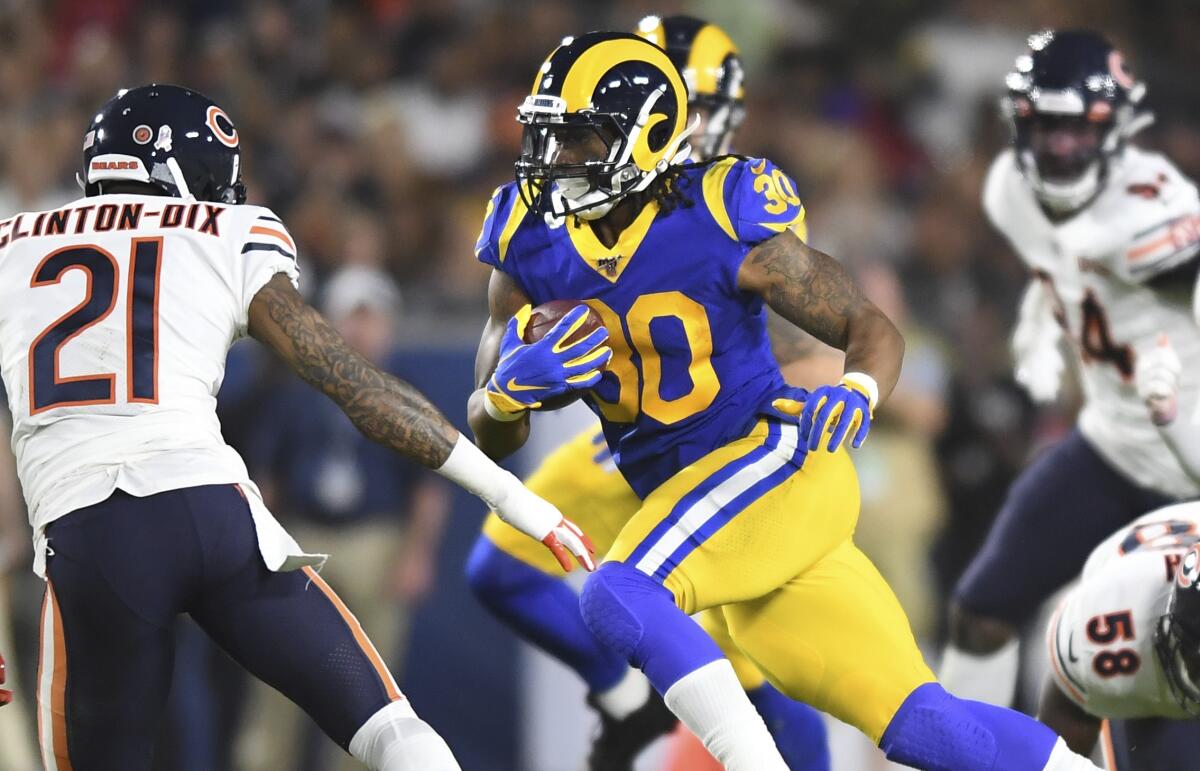 Rams running back Todd Gurley carries the ball against the Bears.