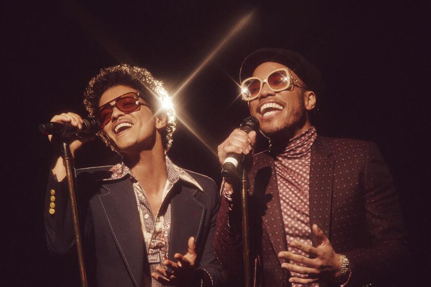  singer Bruno Mars(left) and rapper and singer Anderson .Paak. 