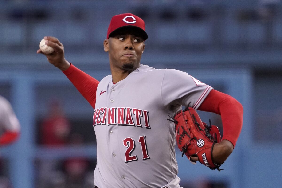 Cincinnati Reds starting pitcher Hunter Greene throws to the plate during the first inning of a baseball game against the Los Angeles Dodgers Saturday, April 16, 2022, in Los Angeles. (AP Photo/Mark J. Terrill)