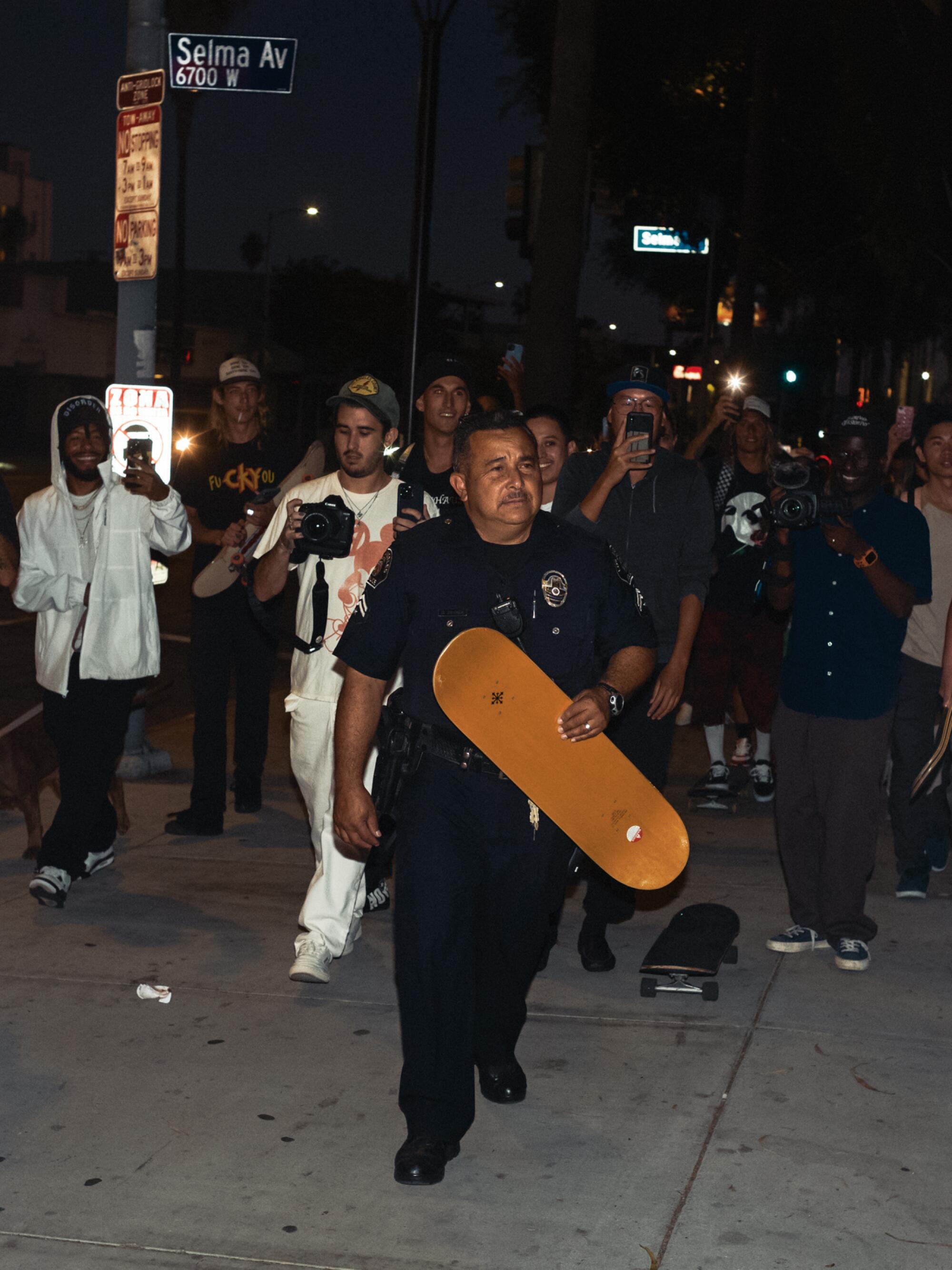 A police officer took Domo Walker's board.