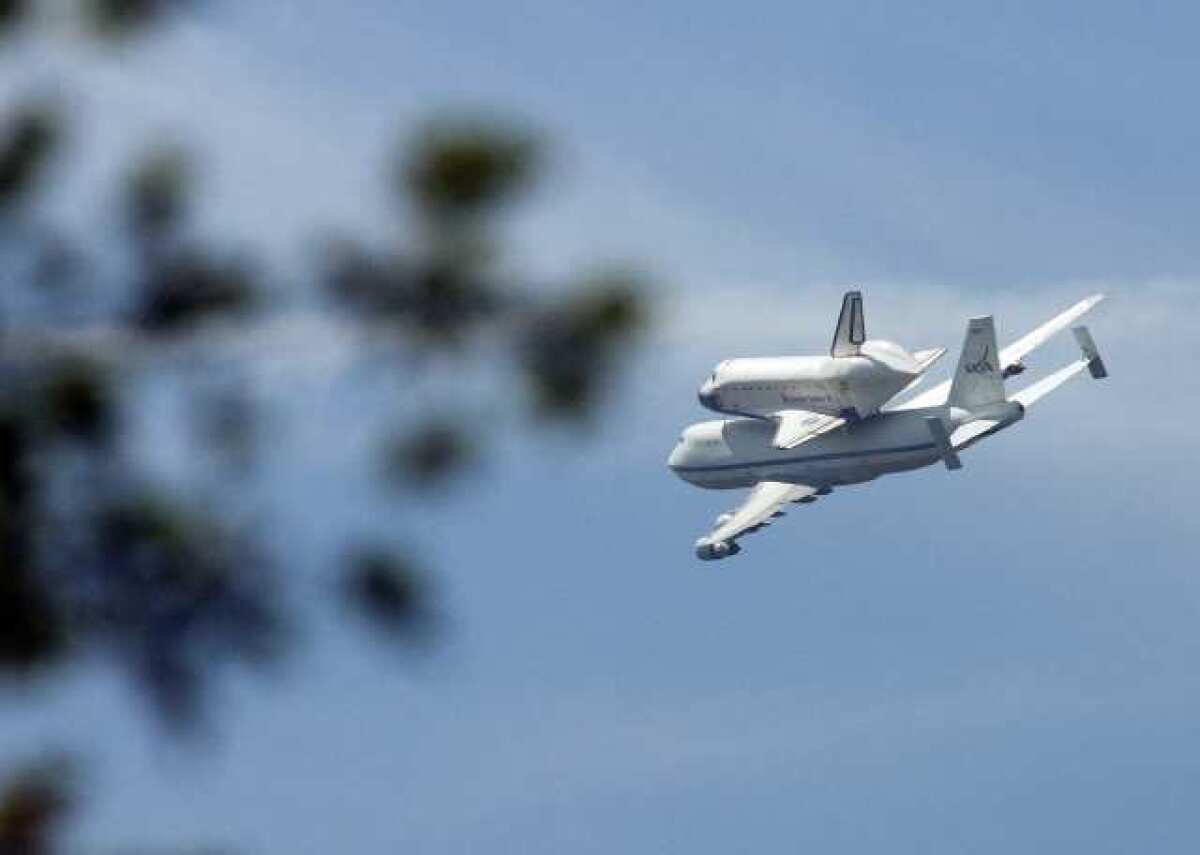 The Space Shuttle Endeavor, after flying over JPL in Pasadena on the final flight of the space shuttle on Friday, September 21, 2012.