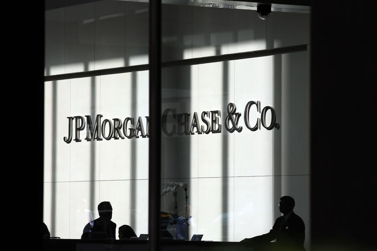 JPMorgan Chase & Co. has agreed to pay $920 million to settle regulatory probes into the "London Whale" trading case.