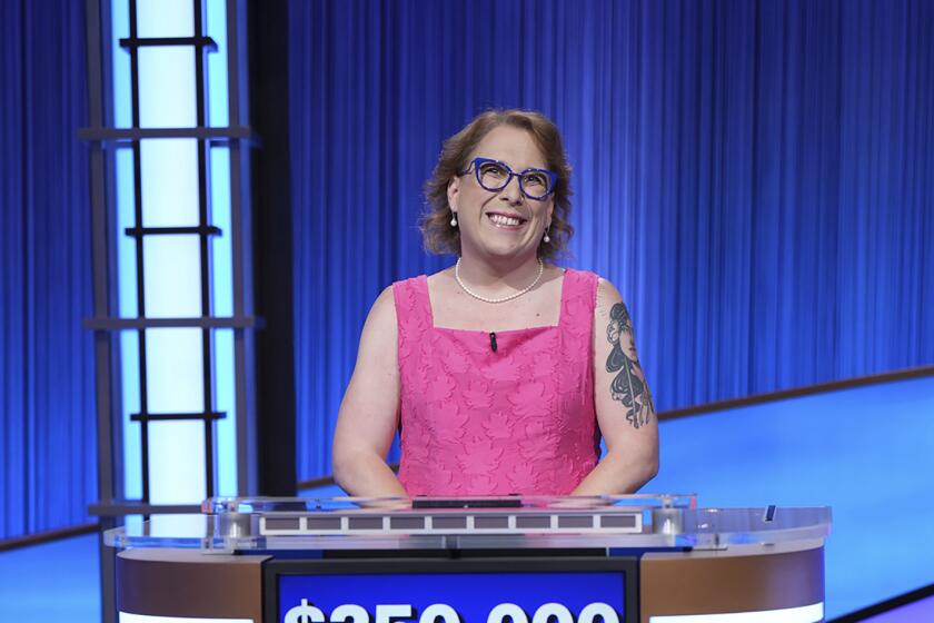 In this undated photo provided by Jeopardy Productions, Inc., "Jeopardy!" contestant Amy Schneider poses for a picture. 