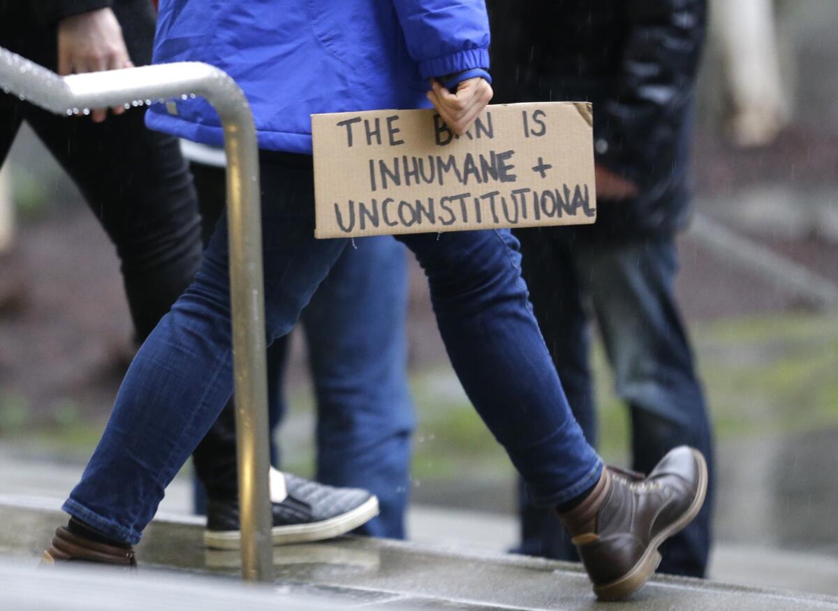 Outside the federal courthouse in Seattle where a judge ordered a temporary halt to a travel ban on immigrants from seven predominantly Muslim countries