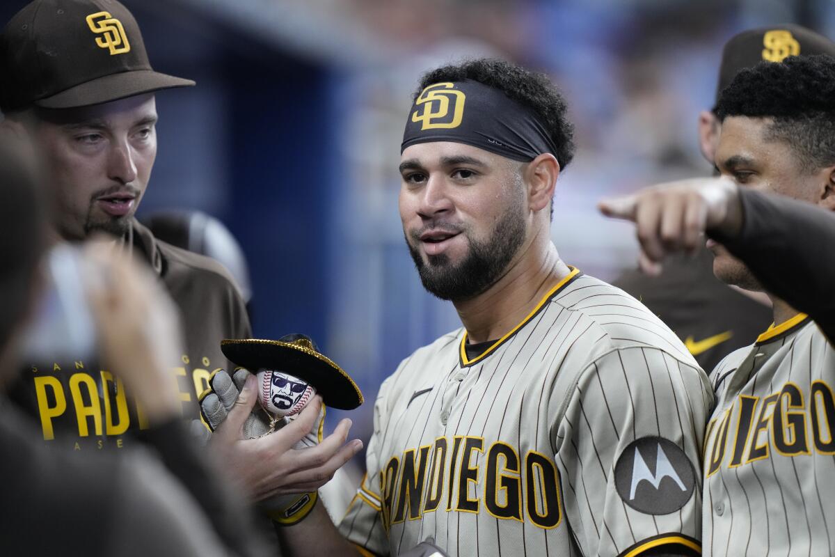 Gary Sanchez and Manny Machado of the San Diego Padres pose for a