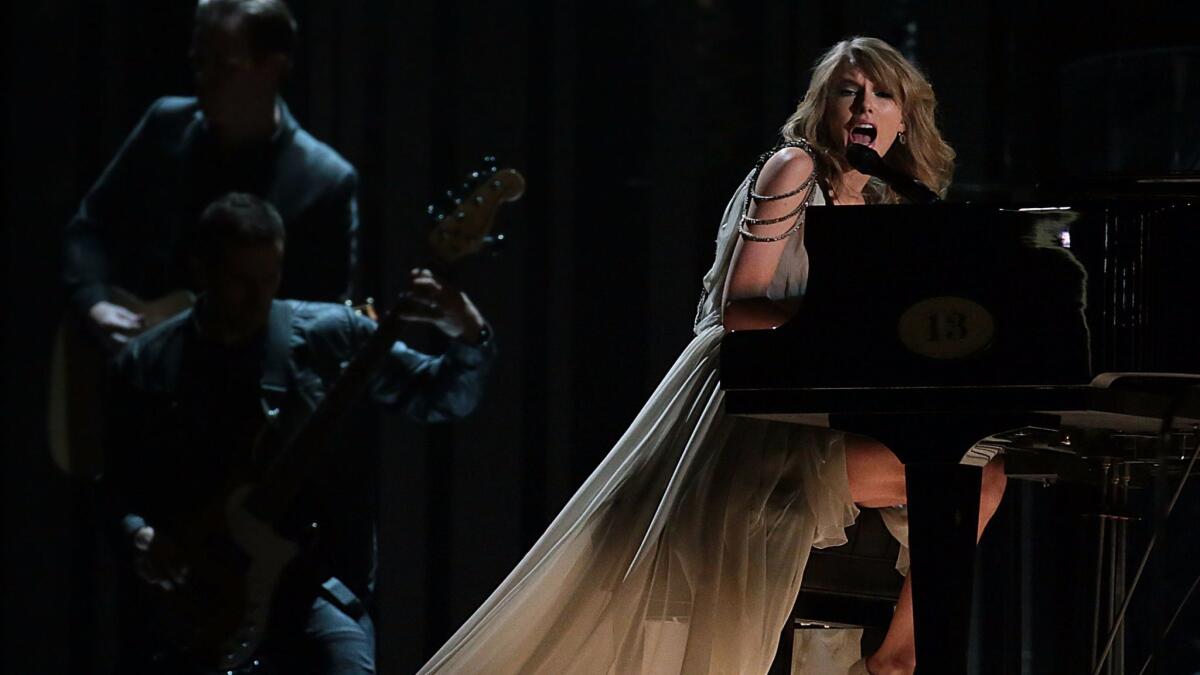 Taylor Swift performing at the 2014 Grammy Awards.