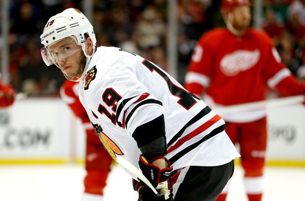 Blackhawks captain Jonathan Toews gets ready for a faceoff against the Red Wings.