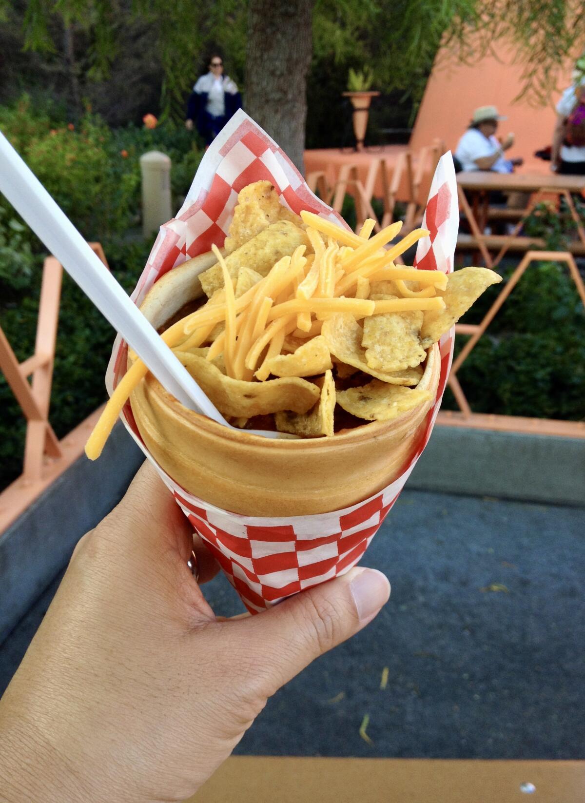 The Chili Cone Queso from Cozy Cone Motel Snacks for $9.99 is a dish that's as fun-filled as it is pun-filled.