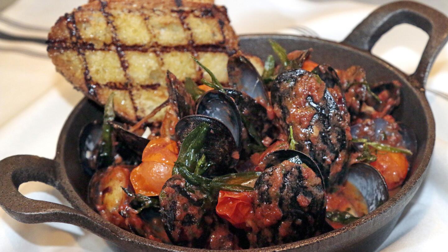 The mussels fra diavolo, in an ultra-reduced tomato-chile sauce, might pair better with an IPA than a glass of wine.