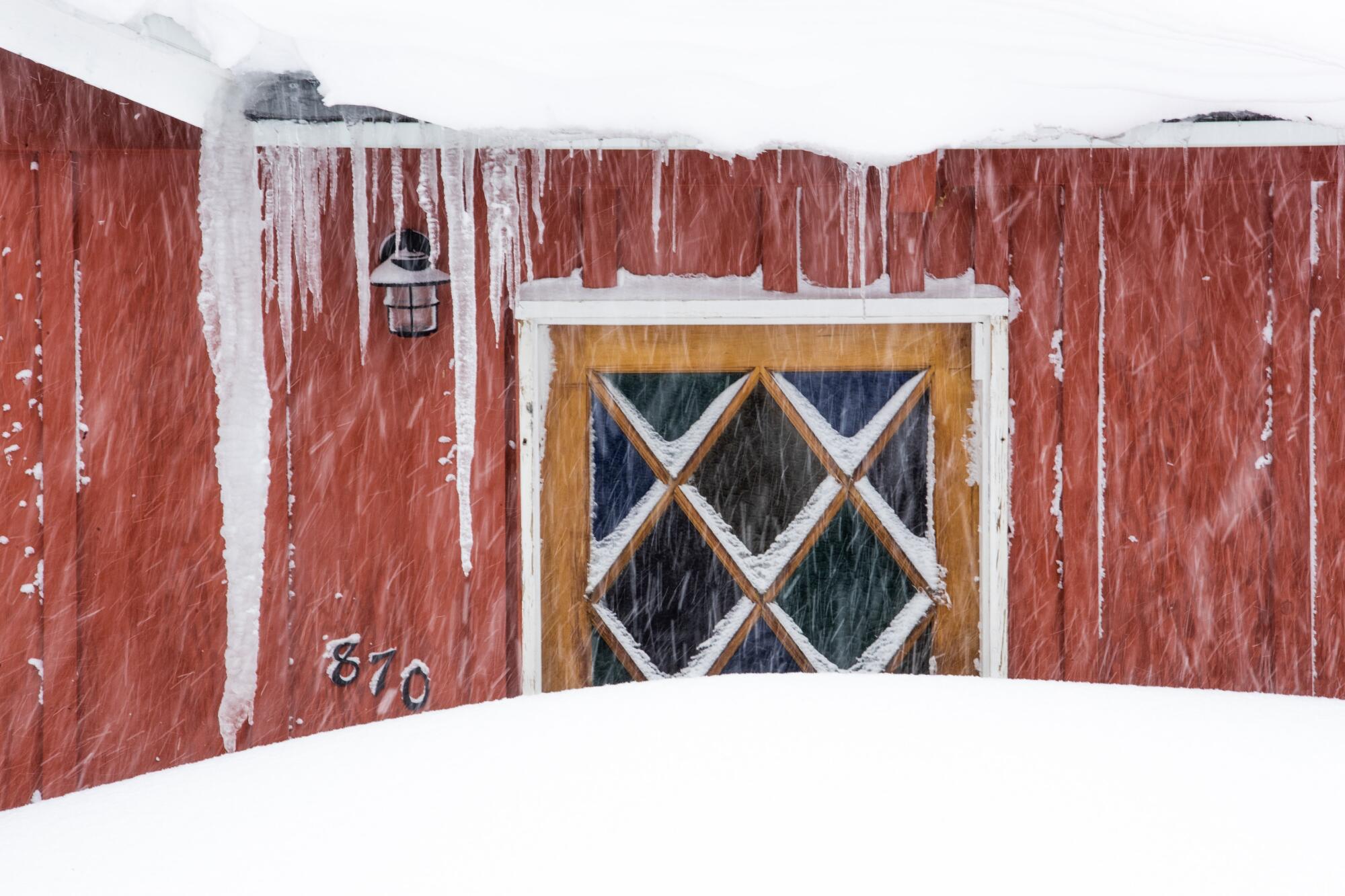 Fresh snow kept residents in their homes and visitors away from resort areas in the San Bernardino Mountains