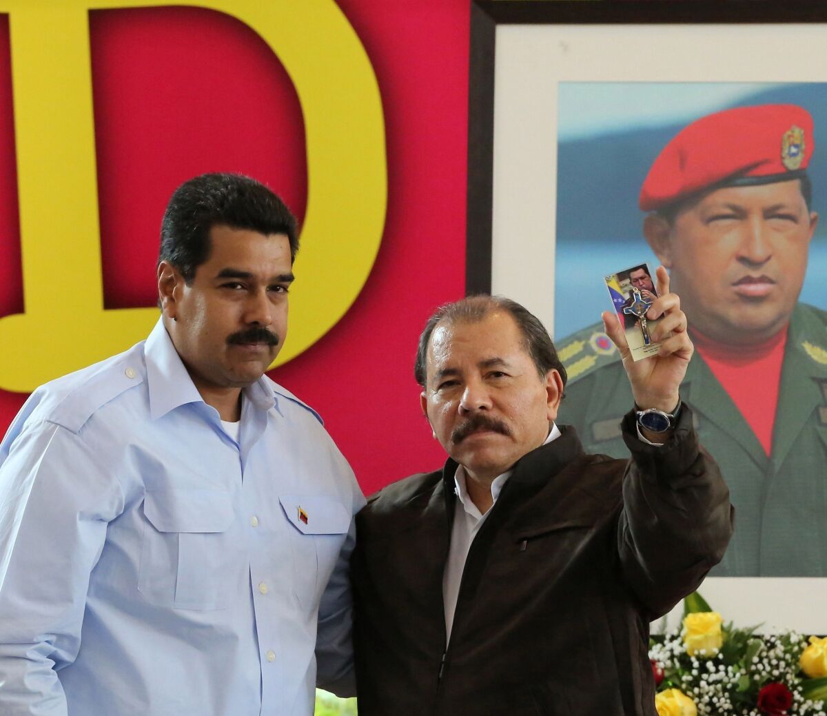 Venezuelan President Nicolas Maduro, left, and Nicaraguan President Daniel Ortega, seen at a meeting last month, have both offered asylum to U.S. intelligence leaker Edward Snowden, who is believed to have been stranded at a Moscow airport since June 23.
