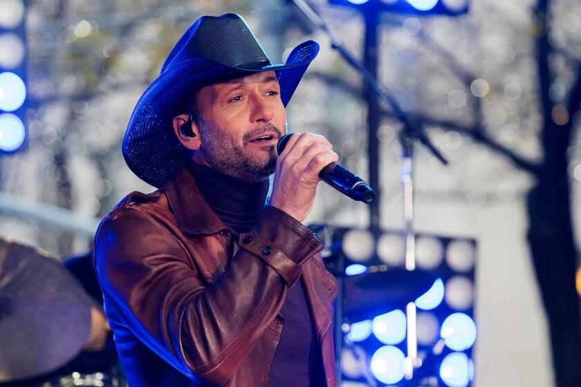 FILE - In this Nov. 17, 2017, file photo, Tim McGraw performs on NBC's "Today" show at Rockefeller Plaza in New York. McGraw collapsed onstage during a performance in Dublin, Ireland, Sunday, March 11, 2018, the Rolling Stone reports. (Photo by Charles Sykes/Invision/AP, File)