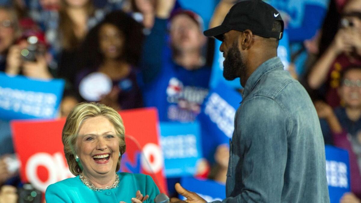 Hillary Clinton in Cleveland with LeBron James on Sunday.