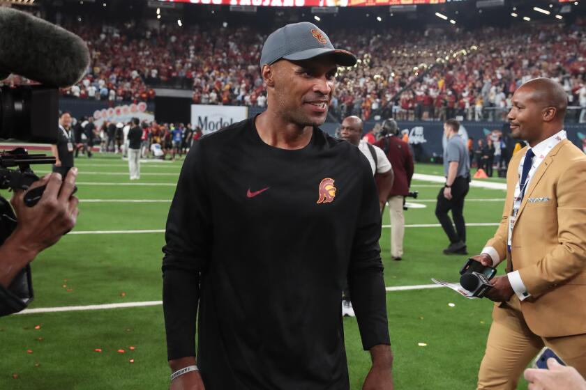 LAS VEGAS, NV - SEPTEMBER 01: USC Trojans defensive coach D'Anton Lynn.