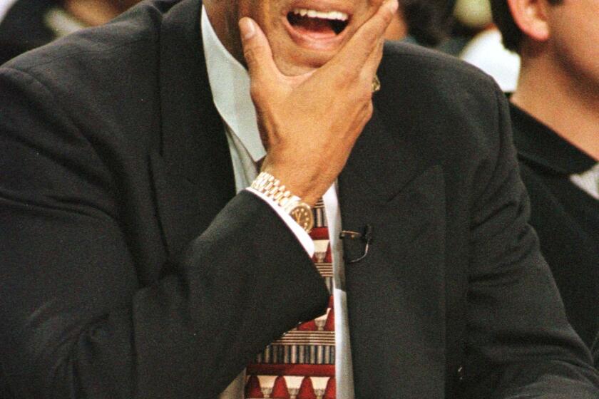 Lionel Hollins during his coaching tenure with the Vancouver Grizzlies.
