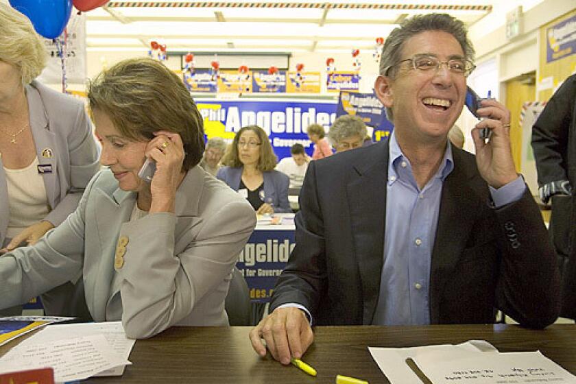 Rep. Nancy Pelosi and state Treasurer Phil Angelides, both Democrats, work a phone bank in Sacramento. Pelosi is likely to become speaker of the House if Democrats win control of the House on Nov. 7. Angelides is trailing in his bid for governor.
