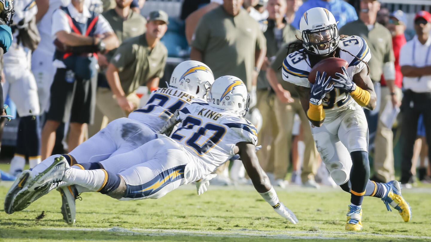 Los Angeles Chargers safety Tre Boston picks off a pass during the second half/overtime against the Jaguars.