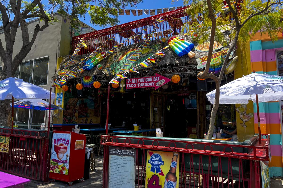 Fiesta Cantina's storefront with pride decorations.