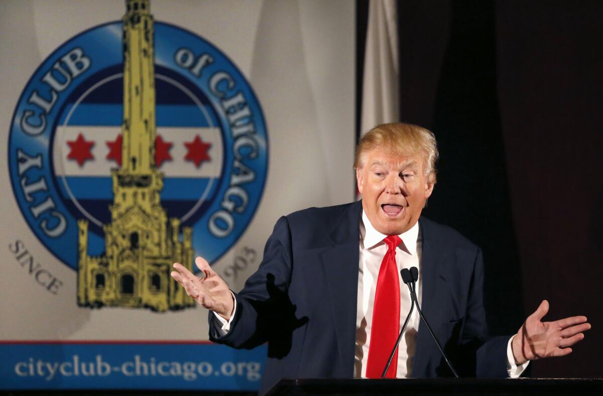 Republican presidential candidate Donald Trump, shown speaking to members of the City Club of Chicago on Monday, says he is suing Spanish-language network Univision for dropping the Miss Universe and Miss USA pageants. The network says it did so because of derogatory comments that Trump made about Mexican immigrants to the United States.