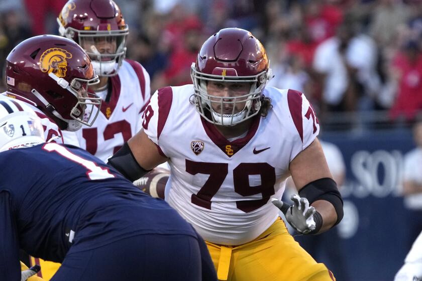 Southern California offensive lineman Jonah Monheim (79) in the first half during an NCAA college football game against Arizona, Saturday, Oct. 29, 2022, in Tucson, Ariz. (AP Photo/Rick Scuteri)