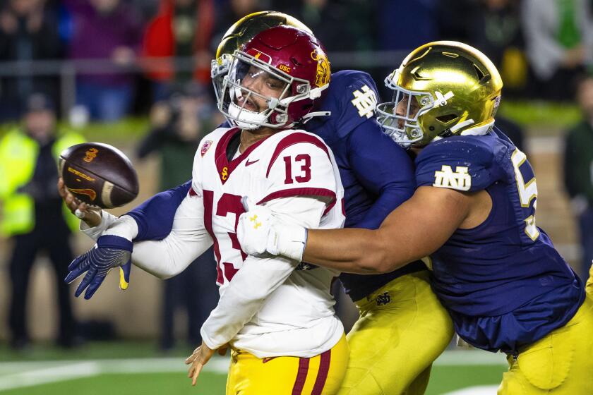 USC quarterback Caleb Williams is sacked as he attempts to throw the ball