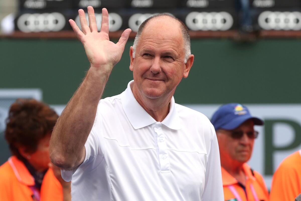 Steve Simon gestures before the start of the women's tennis final at the BNP Paribas Open in Indian Wells, Calif., in March.