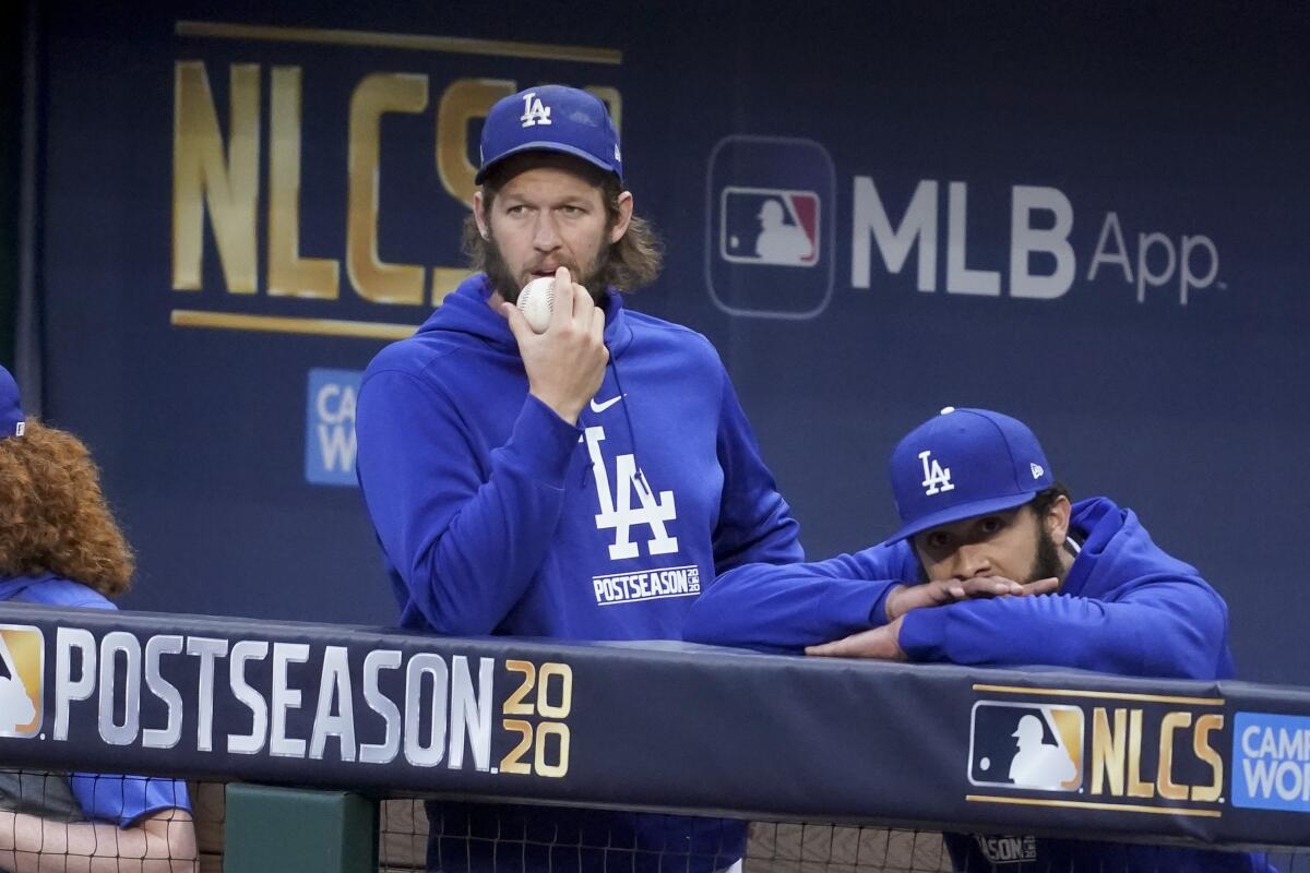 Dodgers pitcher Clayton Kershaw watches during Game 2 of the 2020 NLCS against the Atlanta Braves.