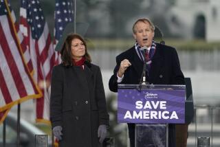 Texas Attorney General Ken Paxton speaks  in in Washington, at a rally in support of Trump.