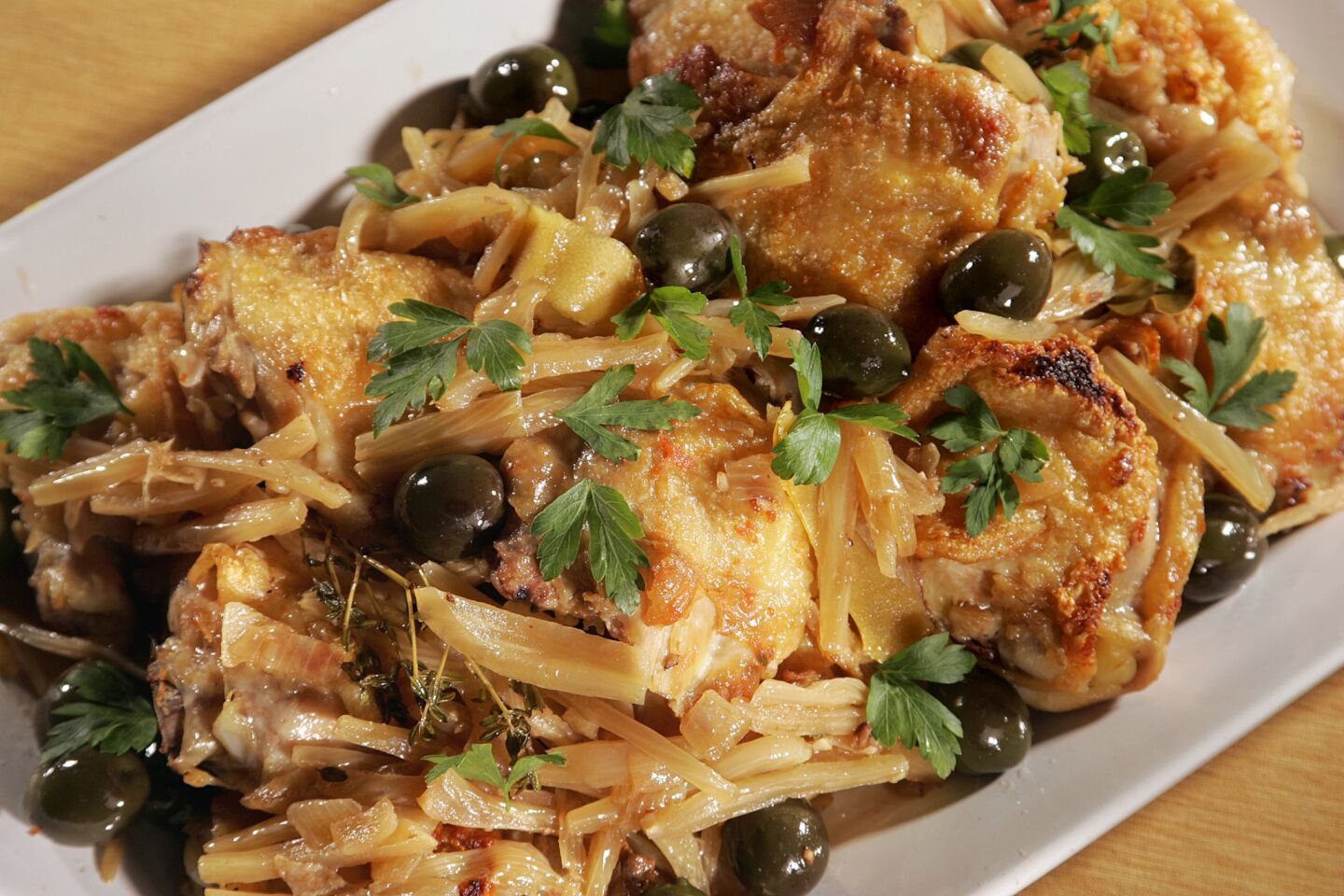 Feel like tackling a Thomas Keller recipe? In this recipe adapted from Keller's "Ad Hoc at Home," crisp, braised chicken thighs are at once rich yet bright with a great harmony of flavors, including olives, lemon zest and thinly sliced fennel. The whole dish comes together in just over an hour.