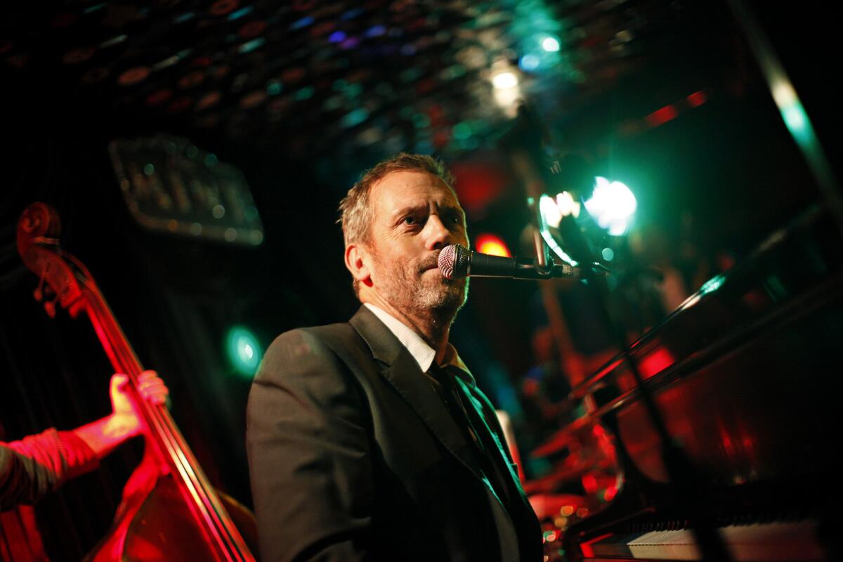 File photo: Actor Hugh Laurie performs with his blues band at The Mint, in Los Angeles, Sept. 30, 2011.