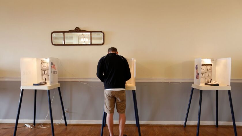 Paul Coneys votes in the Los Angeles mayoral election on March 7 at First Baptist Church of Hollywood.