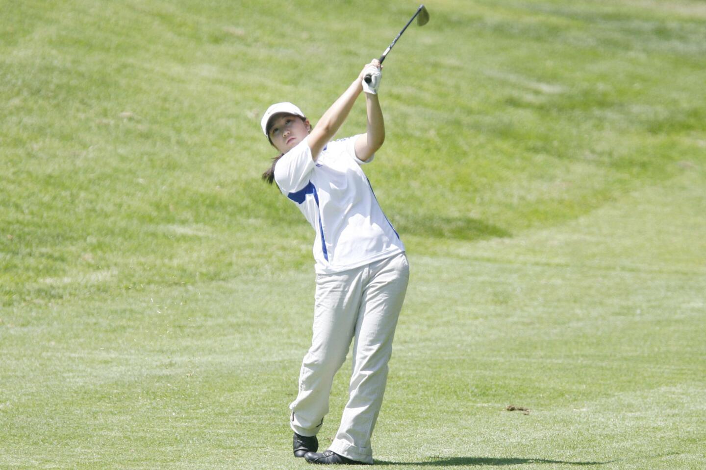 Burbank's Irene Maemura swings at the ball during the Pacific League girls' golf match, which took place at De Bell Golf Club in Burbank on Wednesday, September 12, 2012.