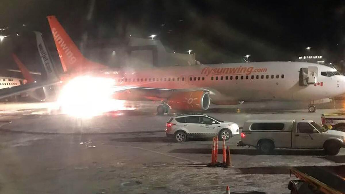 A photo posted by Facebook user Connie Carson shows a Sunwing Airlines jet colliding with a WestJet plane at Toronto's Pearson International Airport.