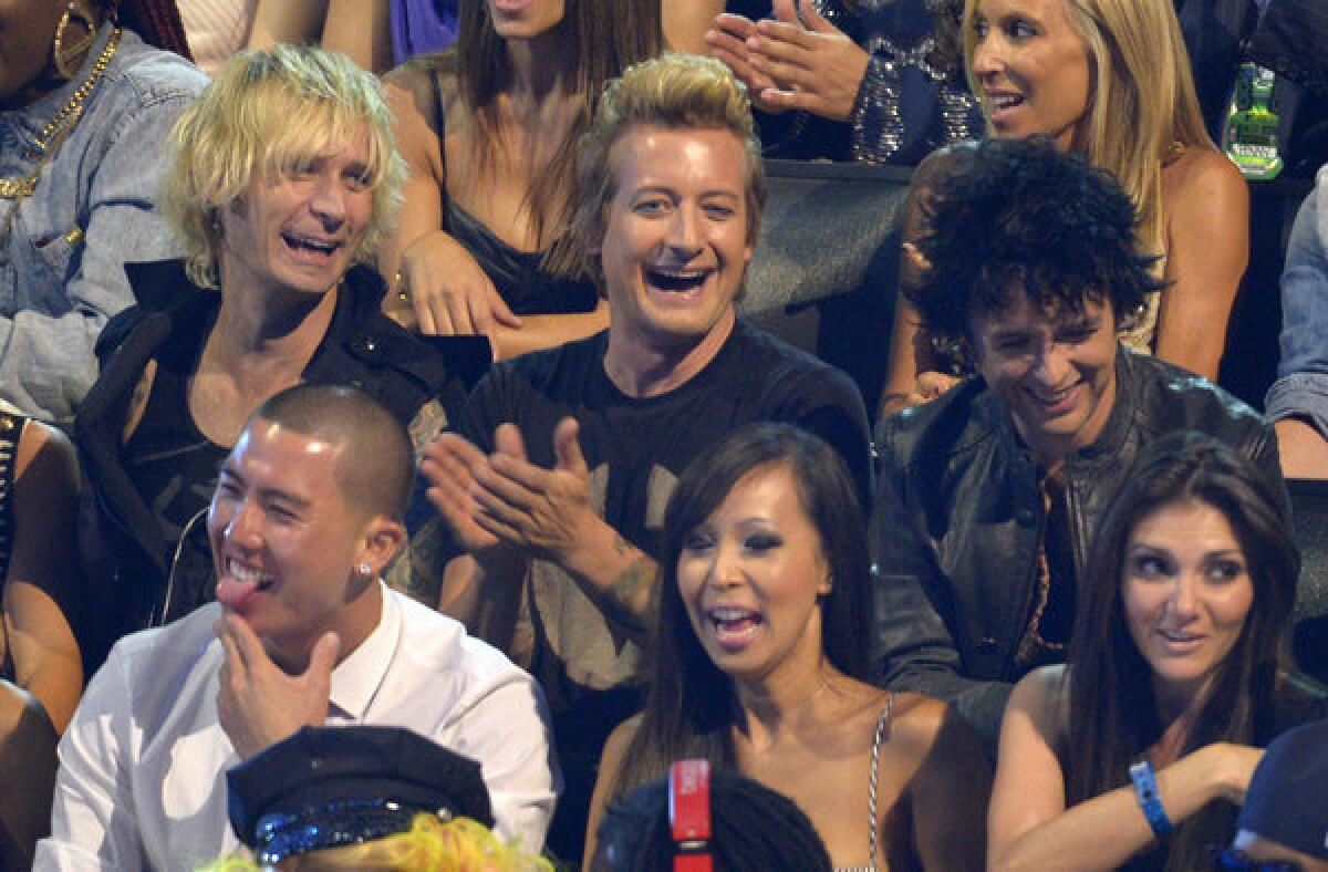 Green Day at the MTV Video Music Awards. Tre Cool, from left, with Mike Dirnt and Billie Joe Armstrong.