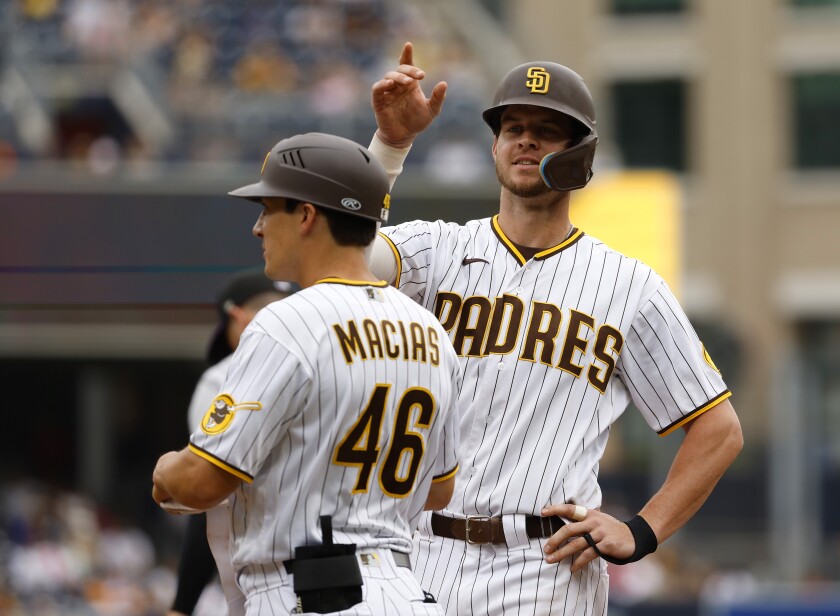 The Padres' Wil Myers stands on first base after a single in the sixth inning against the Colorado Rockies.