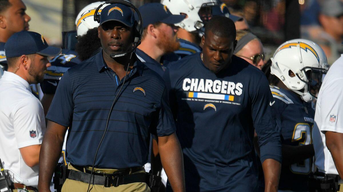The Chargers' rookie head coach, Anthony Lynn, has a future Hall of Famer on his side in tight end Antonio Gates, right.