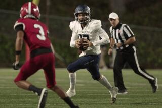 COSTA MESA, CA - SEPTEMBER 15: Sierra Canyon quarterback Wyatt Becker gets chased out of the pocket during first quarter play against Orange Lutheran at Orange Coast College in Costa Mesa, CA on Friday, Sept. 15, 2023. (Myung J. Chun / Los Angeles Times)