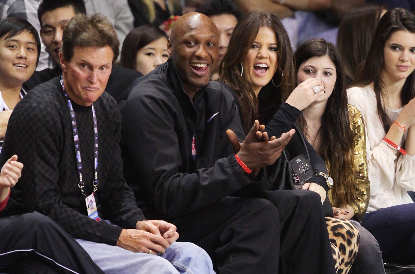 From left: Bruce Jenner, Lamar Odom and Khloe Kardashian play at the 2011 BBVA NBA All-Star Celebrity Game at the Los Angeles Convention Center.